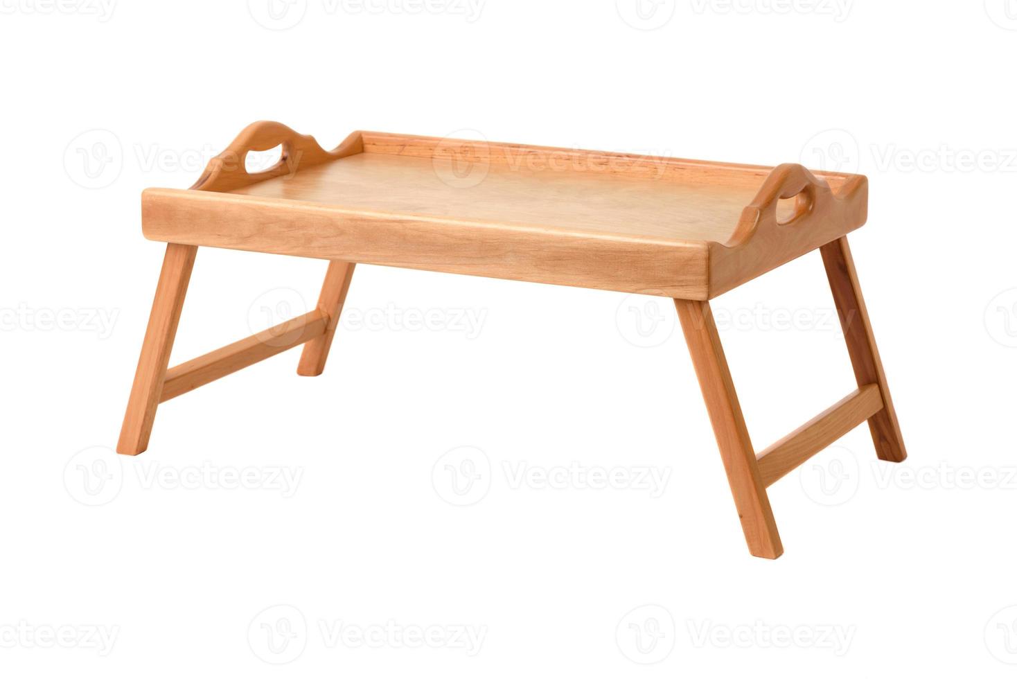 A folding breakfast table with legs on a white background photo