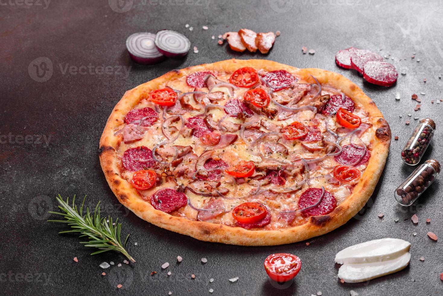 Pepperoni Pizza with Mozzarella cheese, salami, ham photo