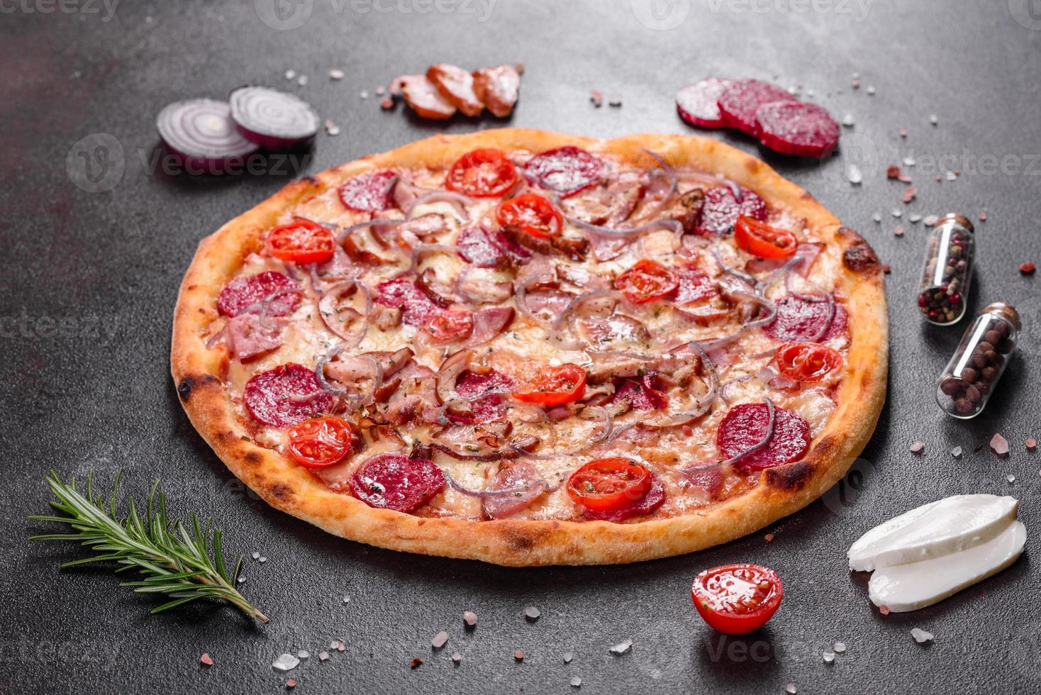 Pepperoni Pizza with Mozzarella cheese, salami, ham photo