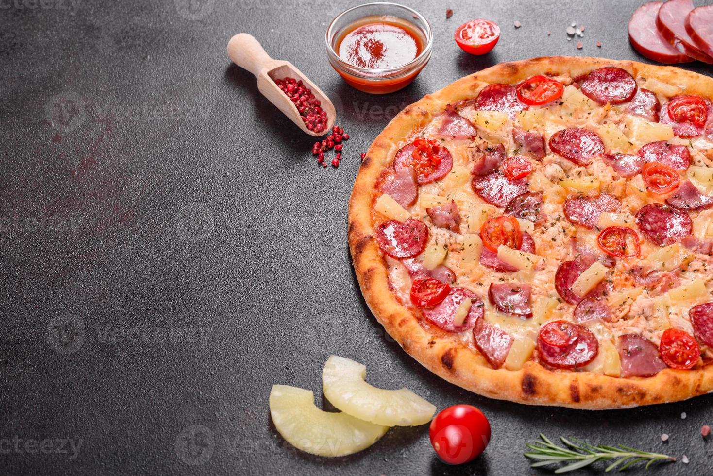 Pepperoni Pizza with Mozzarella cheese, salami, ham photo