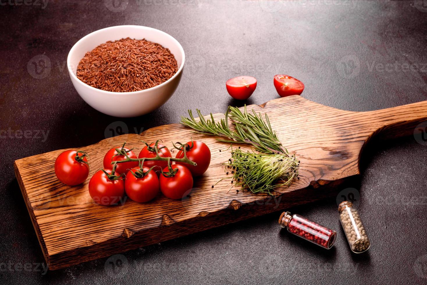 Ingredients for Indian cuisine are on a black surface photo