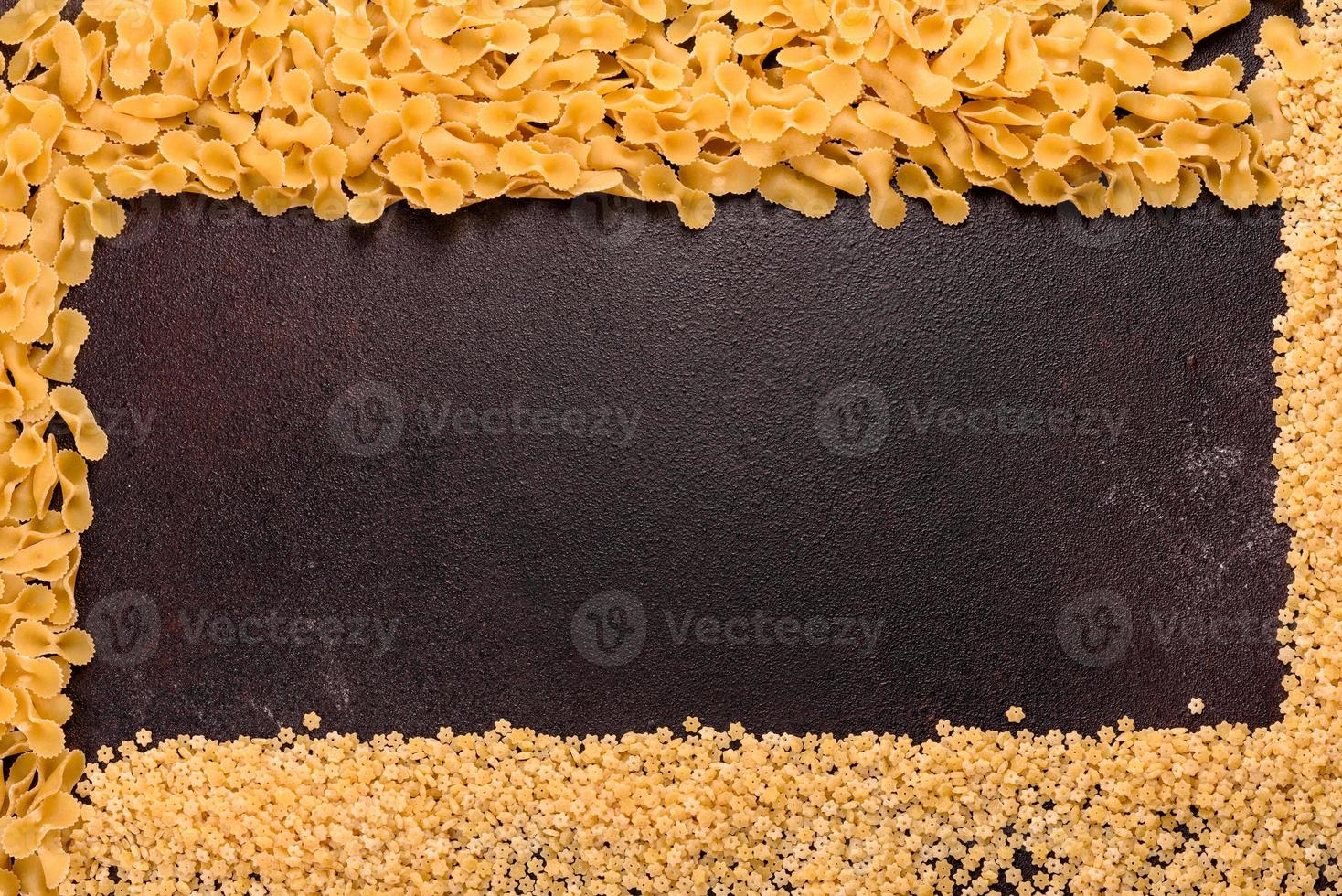 Ingredients for cooking paste on a dark background photo