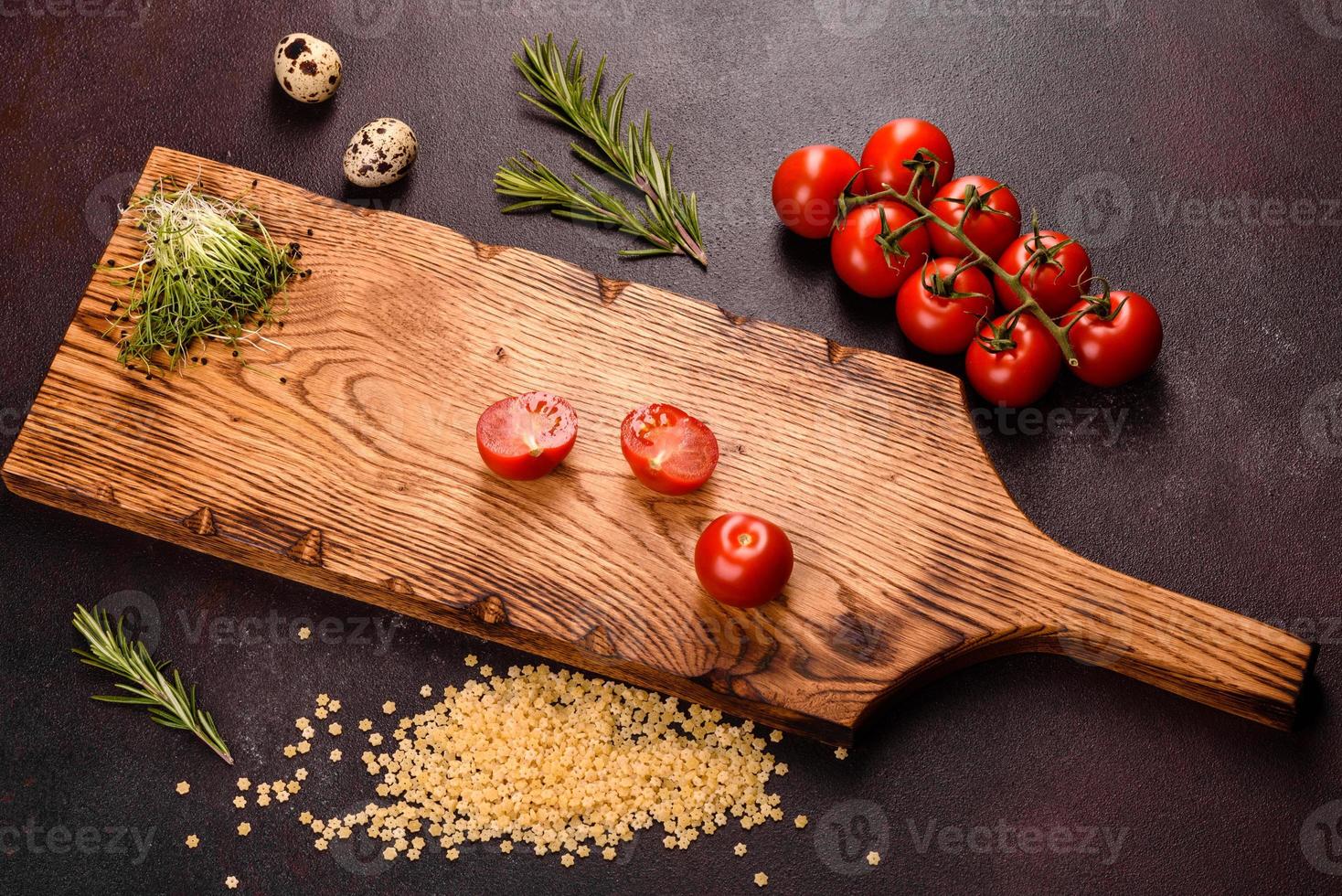 Ingredients for cooking paste on a dark background photo