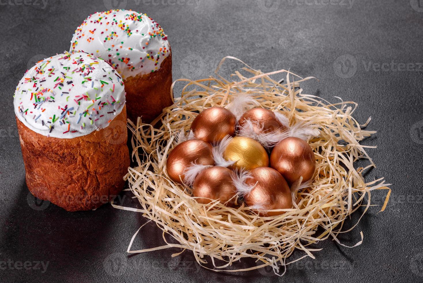 Easter golden eggs in the nest, preparation for the holiday photo