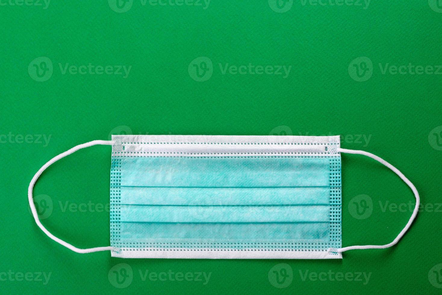 Medical mask on a colored background photo