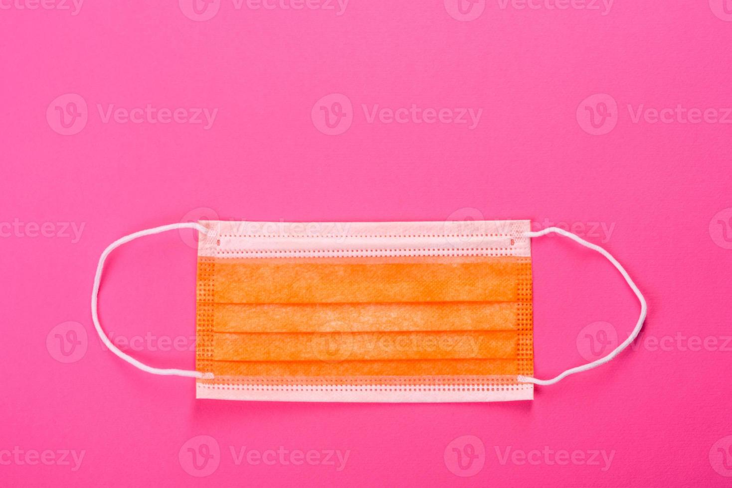 Medical mask on a colored background photo