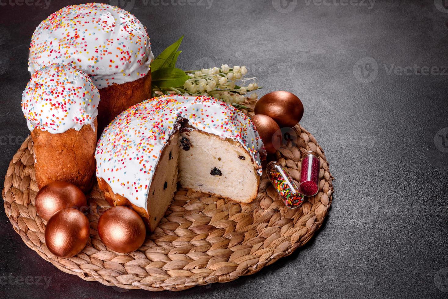 Easter eggs gold and bronze and Easter cake photo