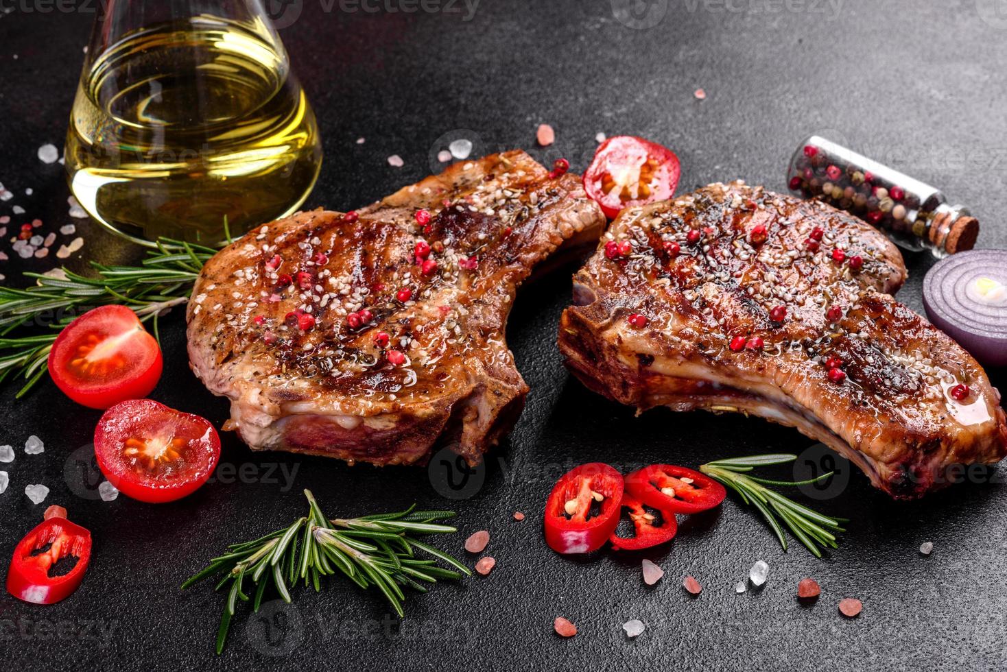 Fresh delicious juicy steak on the bones photo