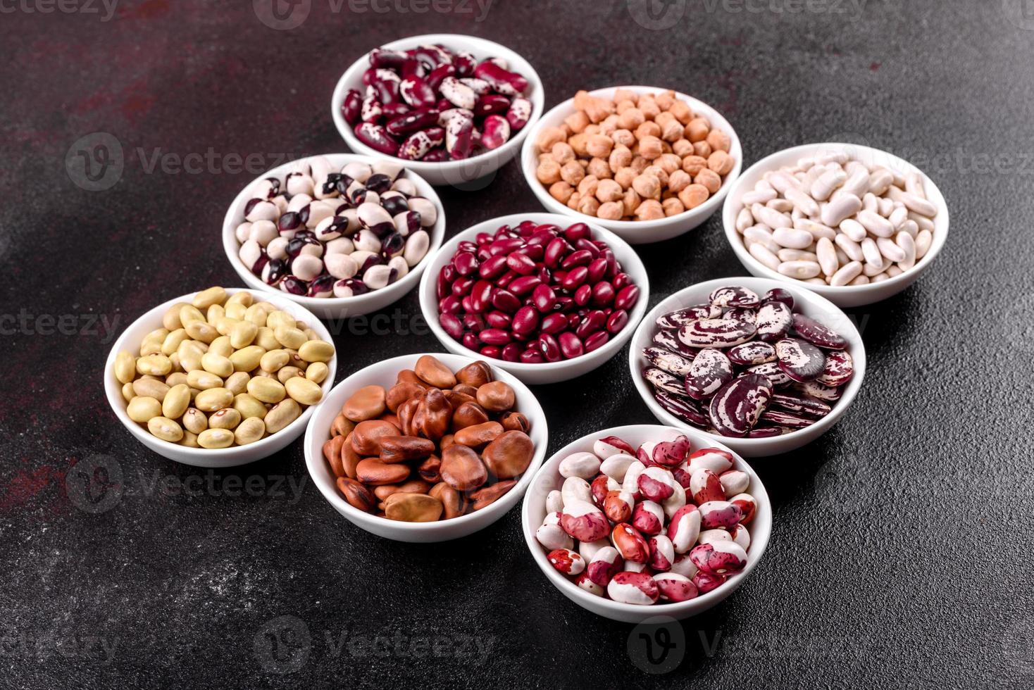 Pulses health food selection in white porcelain dishes photo