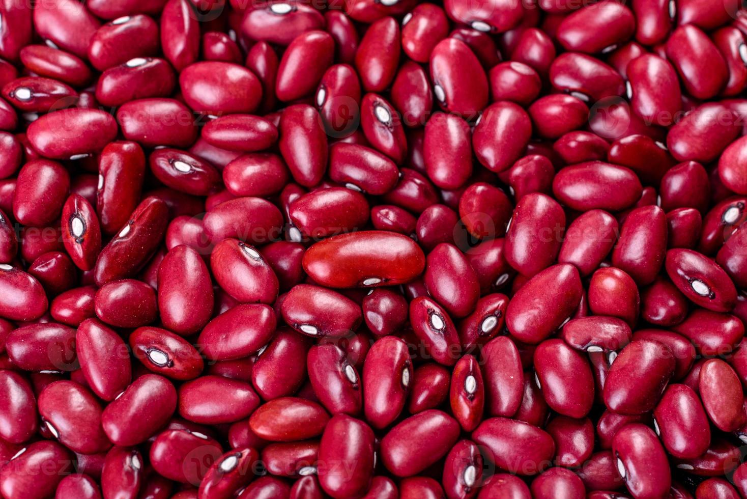 Beautiful multicolored beans close-up on a concrete background photo