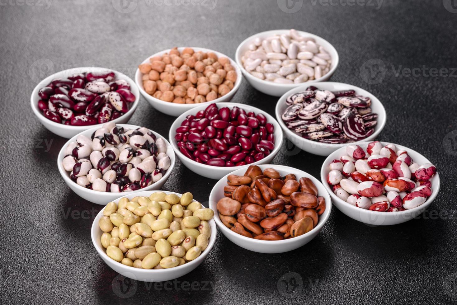 Pulses health food selection in white porcelain dishes photo