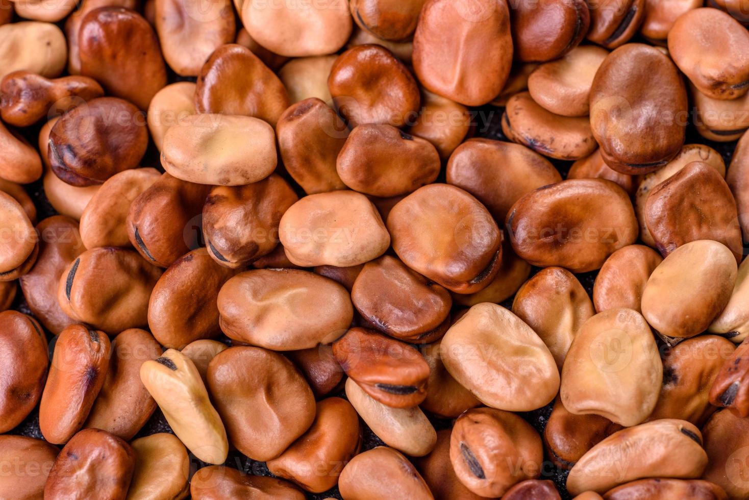 Beautiful multicolored beans close-up on a concrete background photo