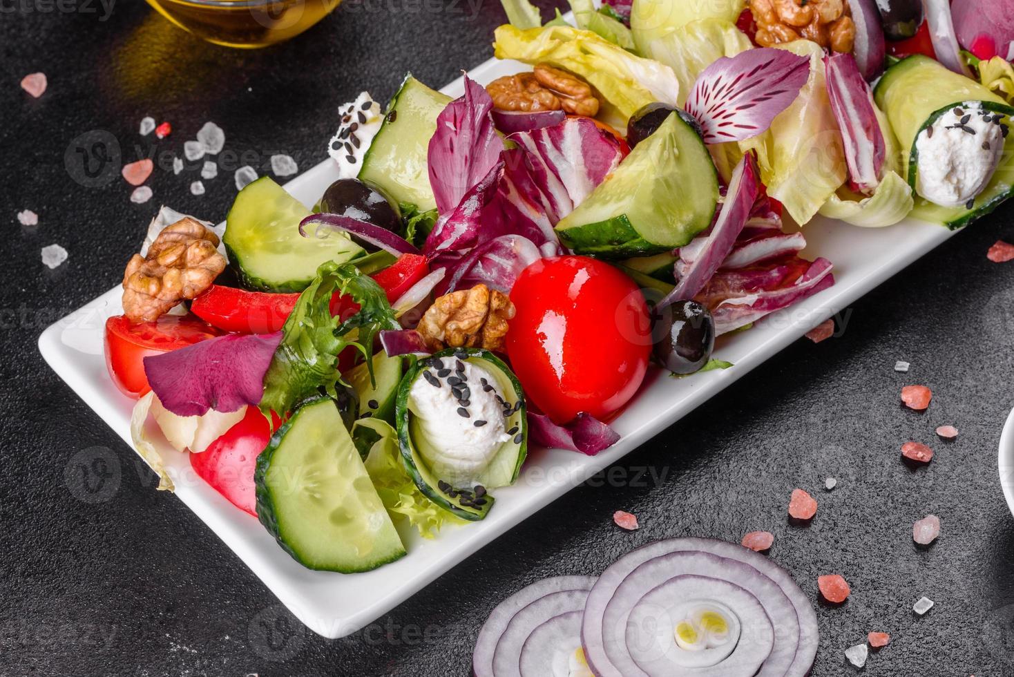 Healthy salad with cherry tomatoes, organic olives photo