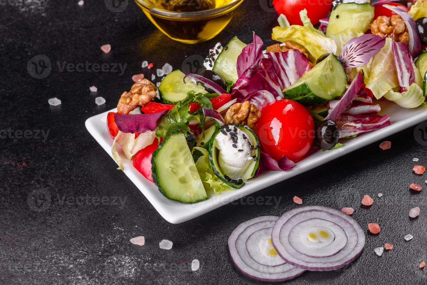 Healthy salad with cherry tomatoes, organic olives photo