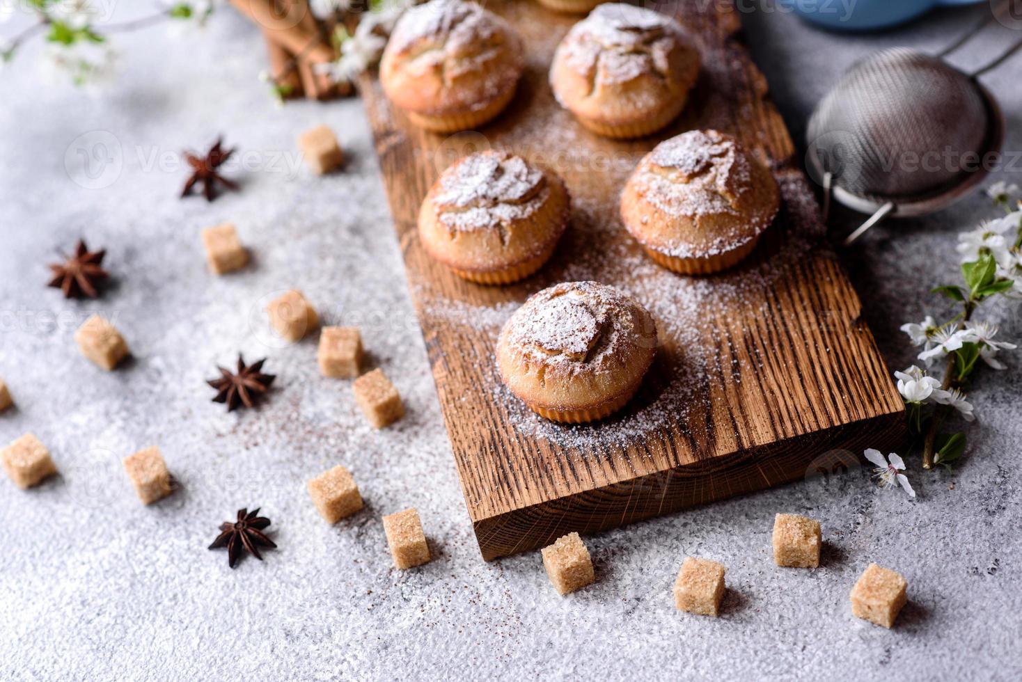 Fresh baked cupcakes of rice flour with banana and vanilla photo