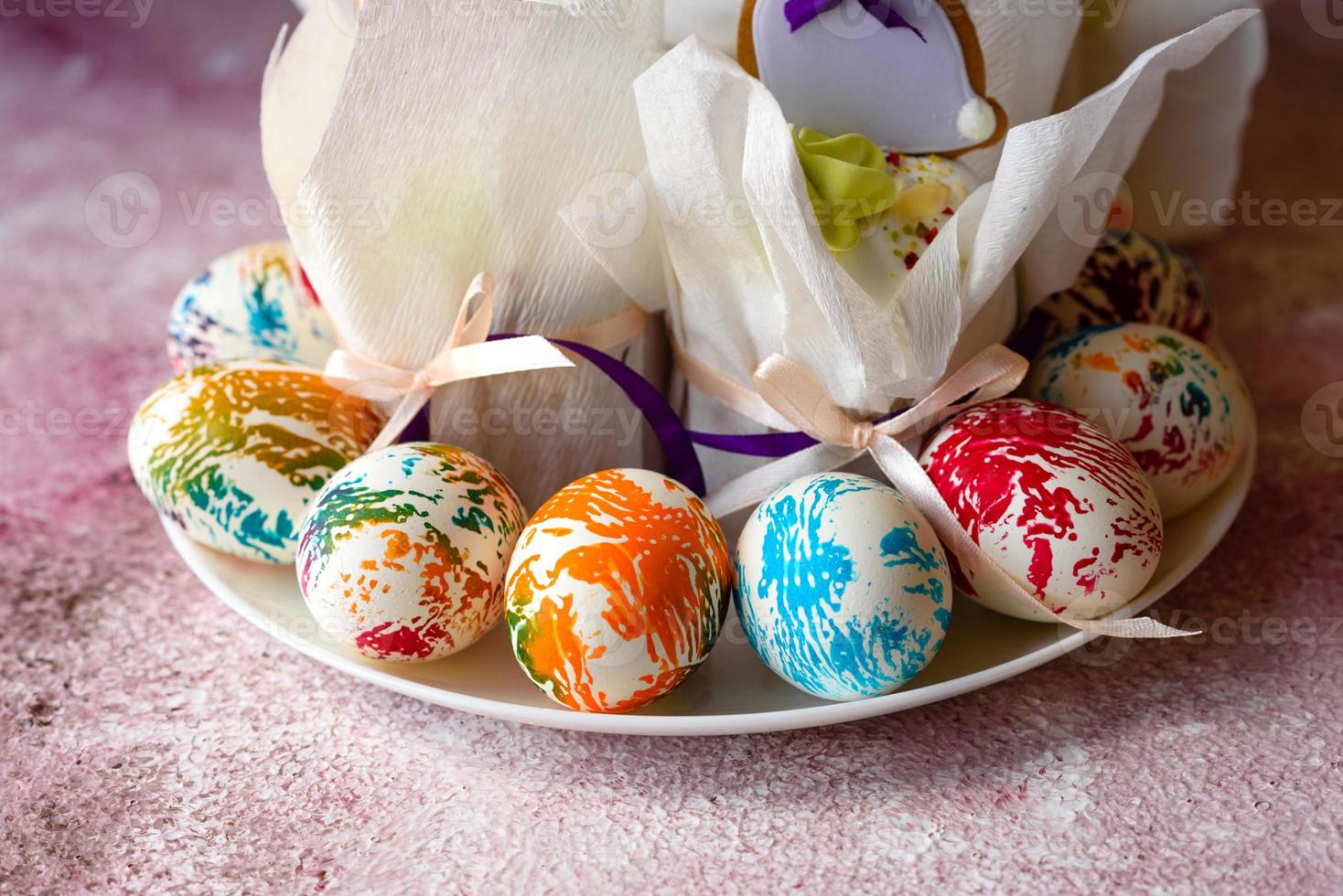 Easter bright multicolored eggs with Easter pies photo