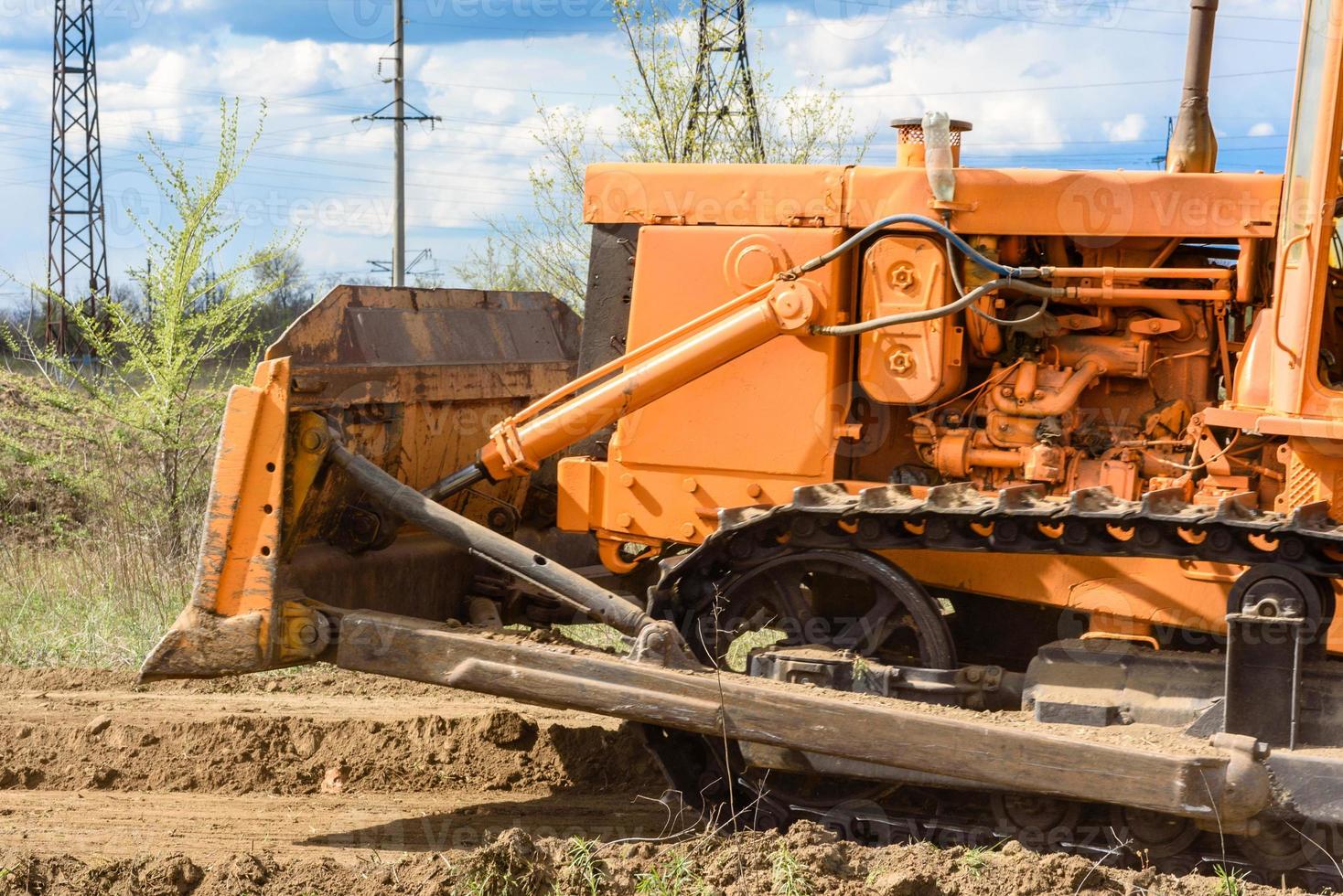 Industrial building construction site bulldozer photo