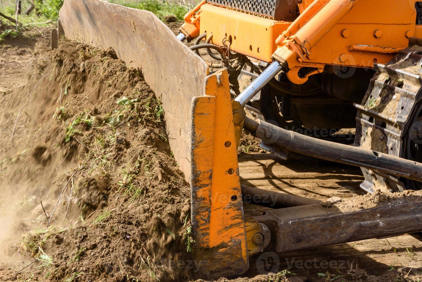 Industrial building construction site bulldozer photo