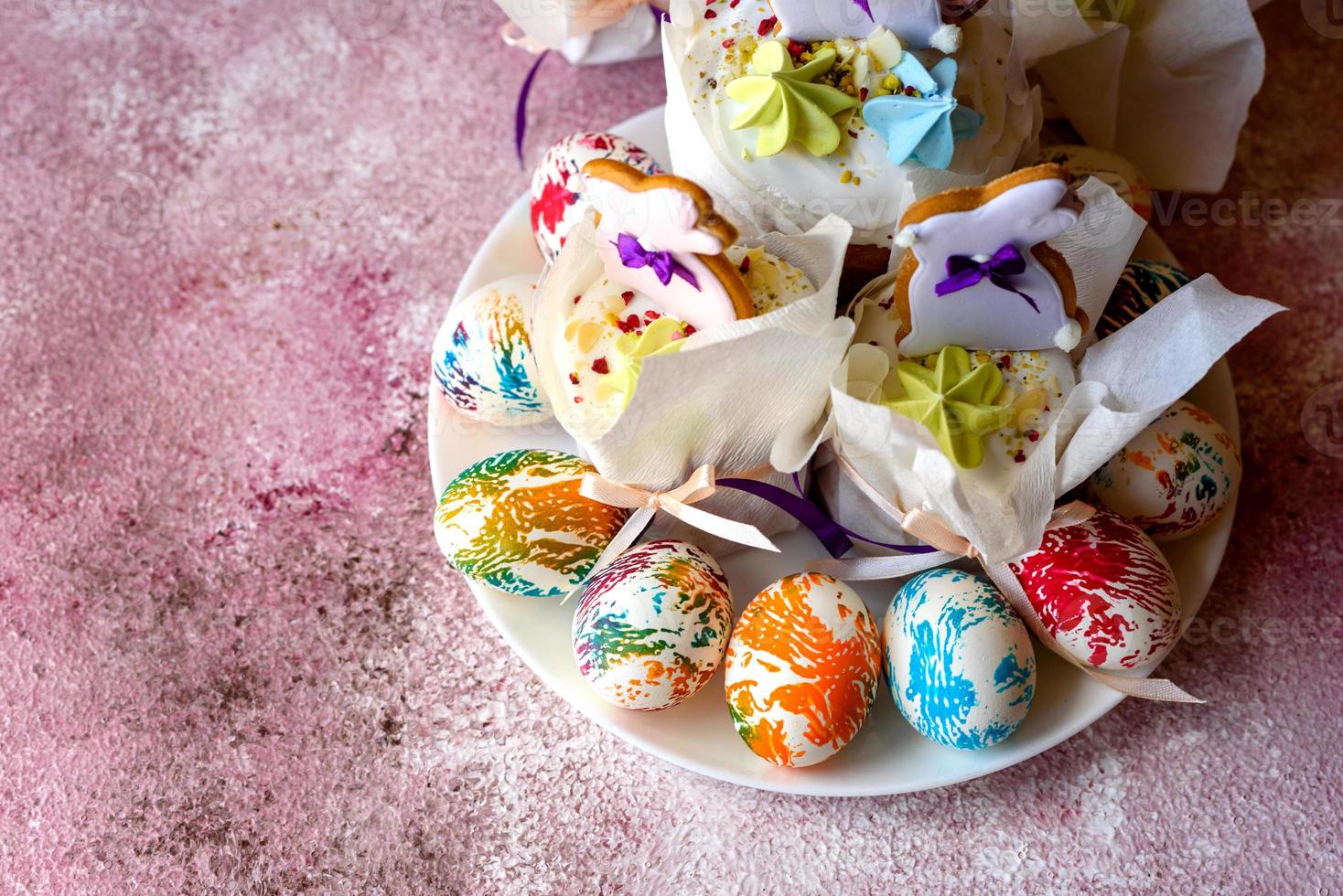 Easter bright multicolored eggs with Easter pies photo