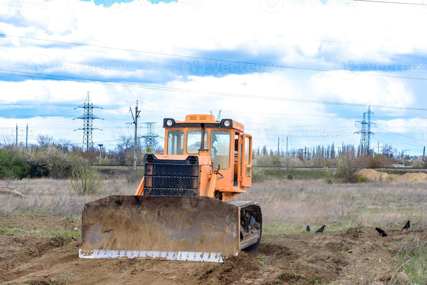 Industrial building construction site bulldozer photo