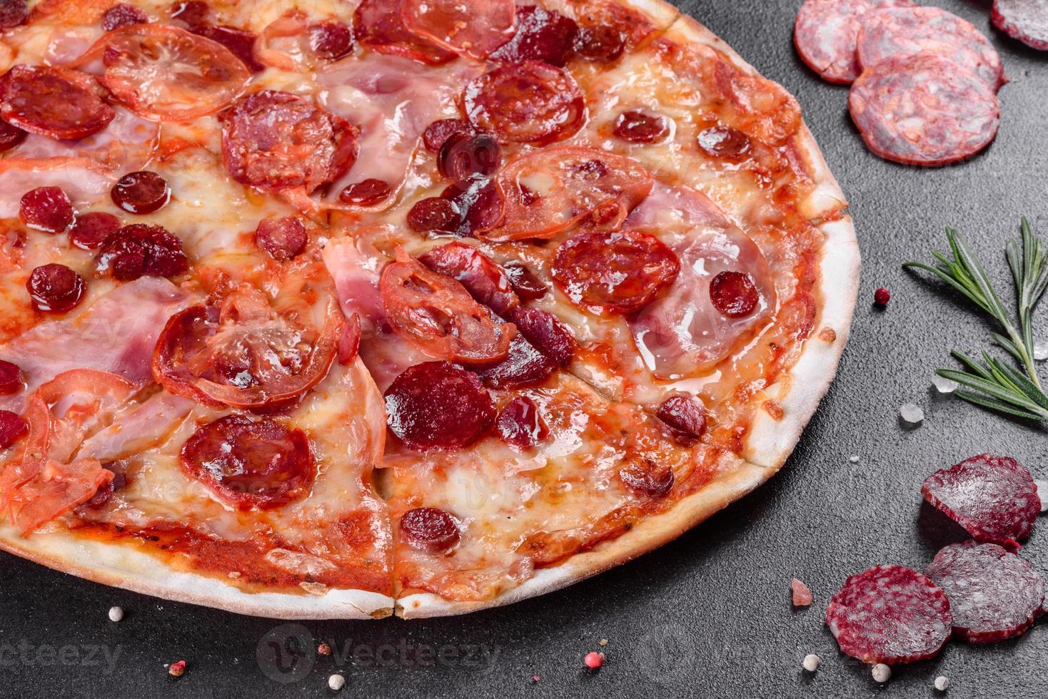 Pepperoni pizza with mozzarella cheese photo