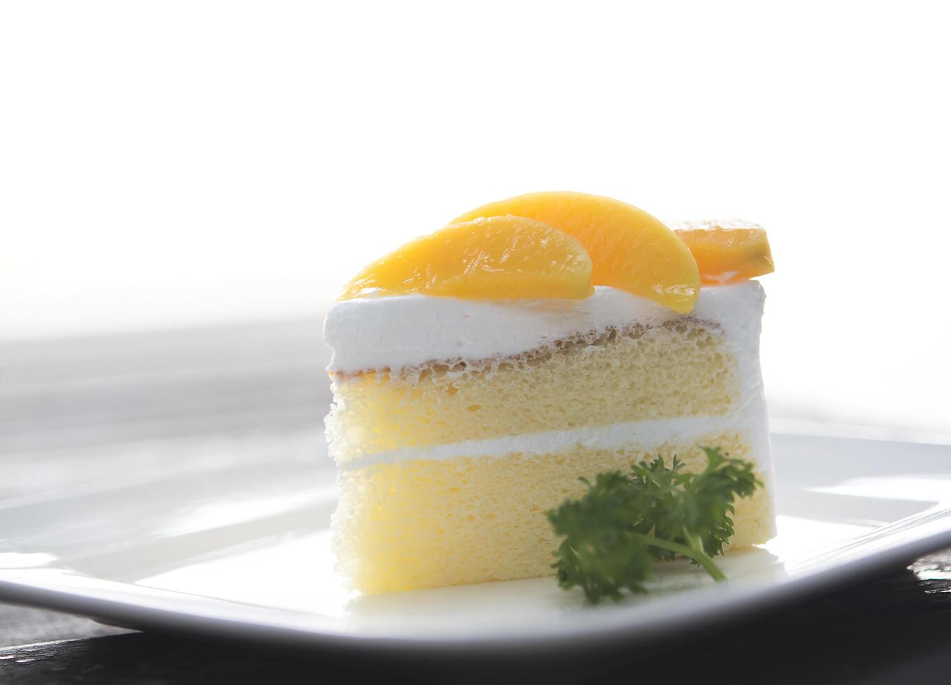 Orange and white cake photo