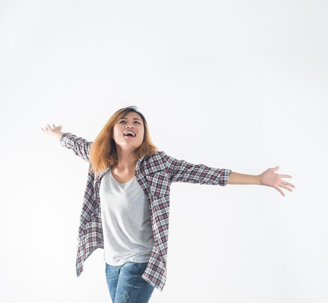 Freedom young hipster woman raising hands with isolated over photo