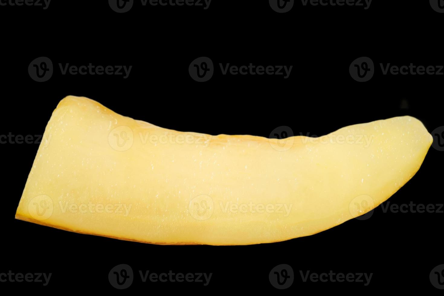 Melon piece isolate on black background. yellow ripe yellow melon. photo