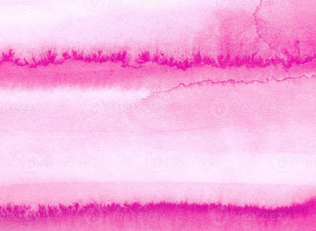 Fondo de acuarela rosa con toques. textura abstracta foto