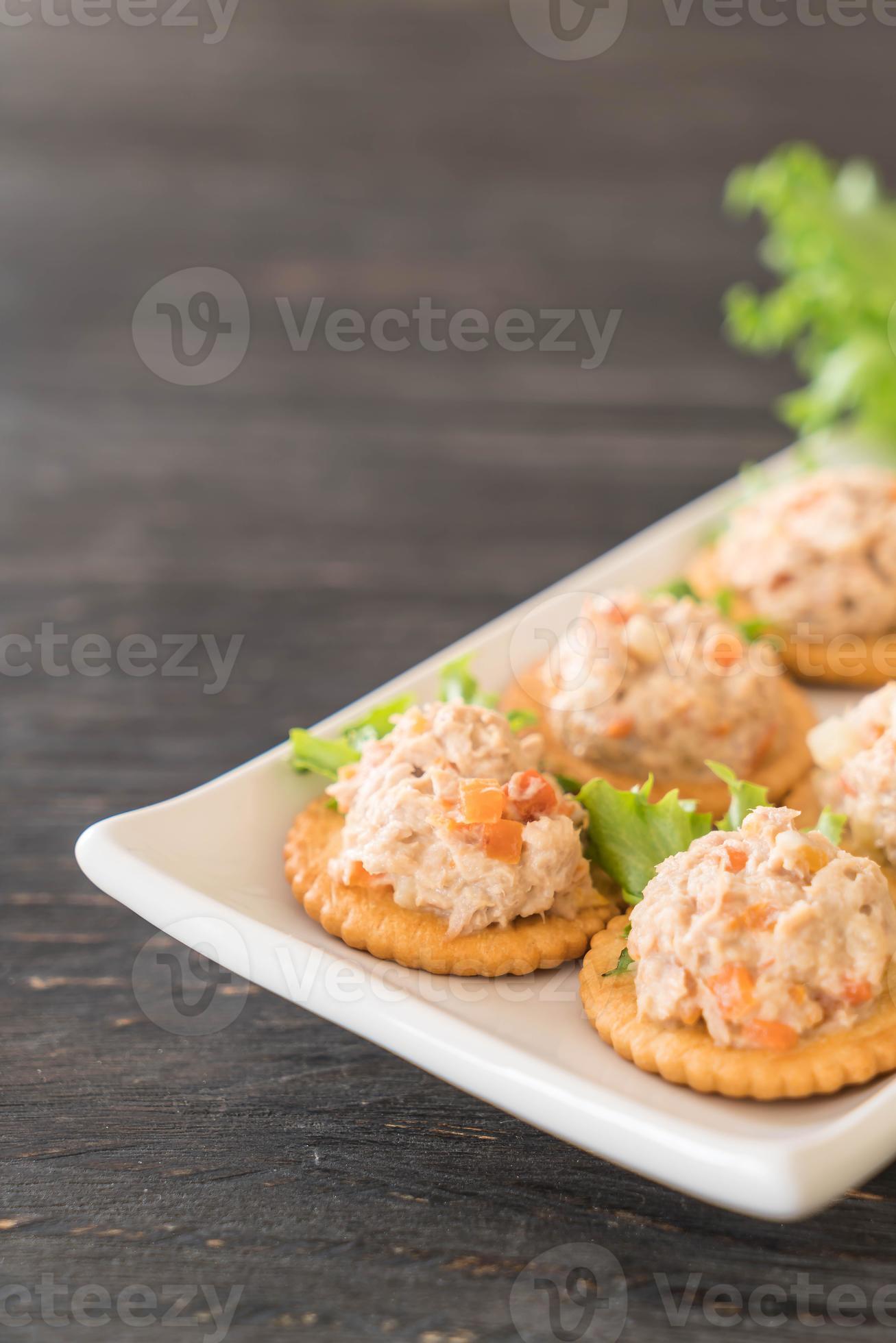 Tuna spread with cracker on wood board 3147710 Stock Photo at Vecteezy