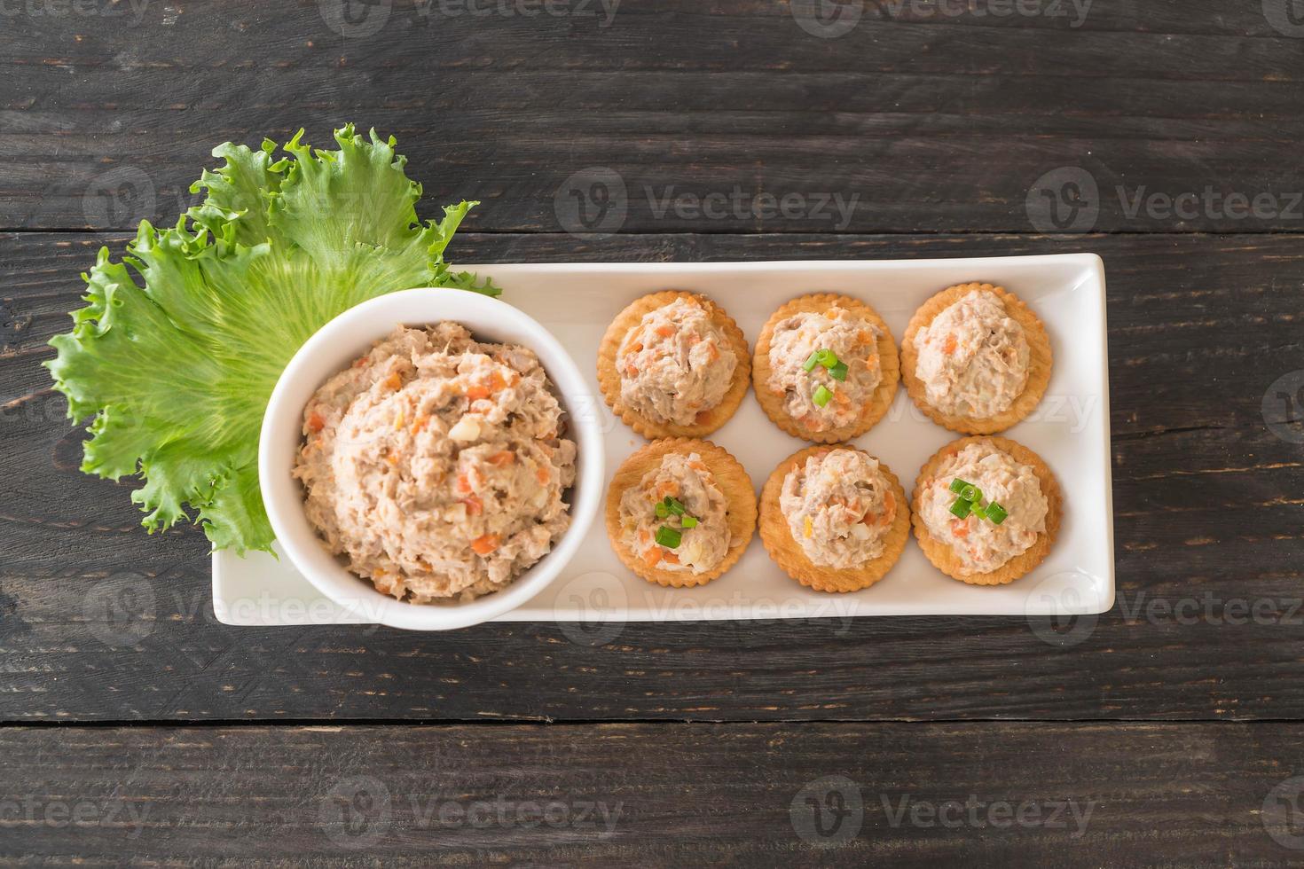 Tuna spread with cracker on wood board 3147721 Stock Photo at Vecteezy
