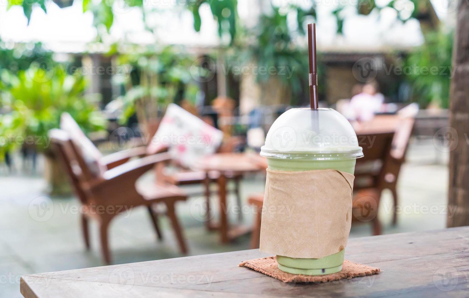 Milk green tea frappe in cafe photo