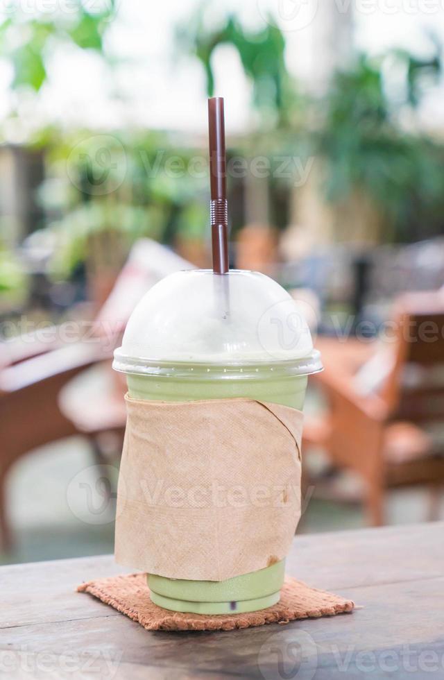 Milk green tea frappe in cafe photo