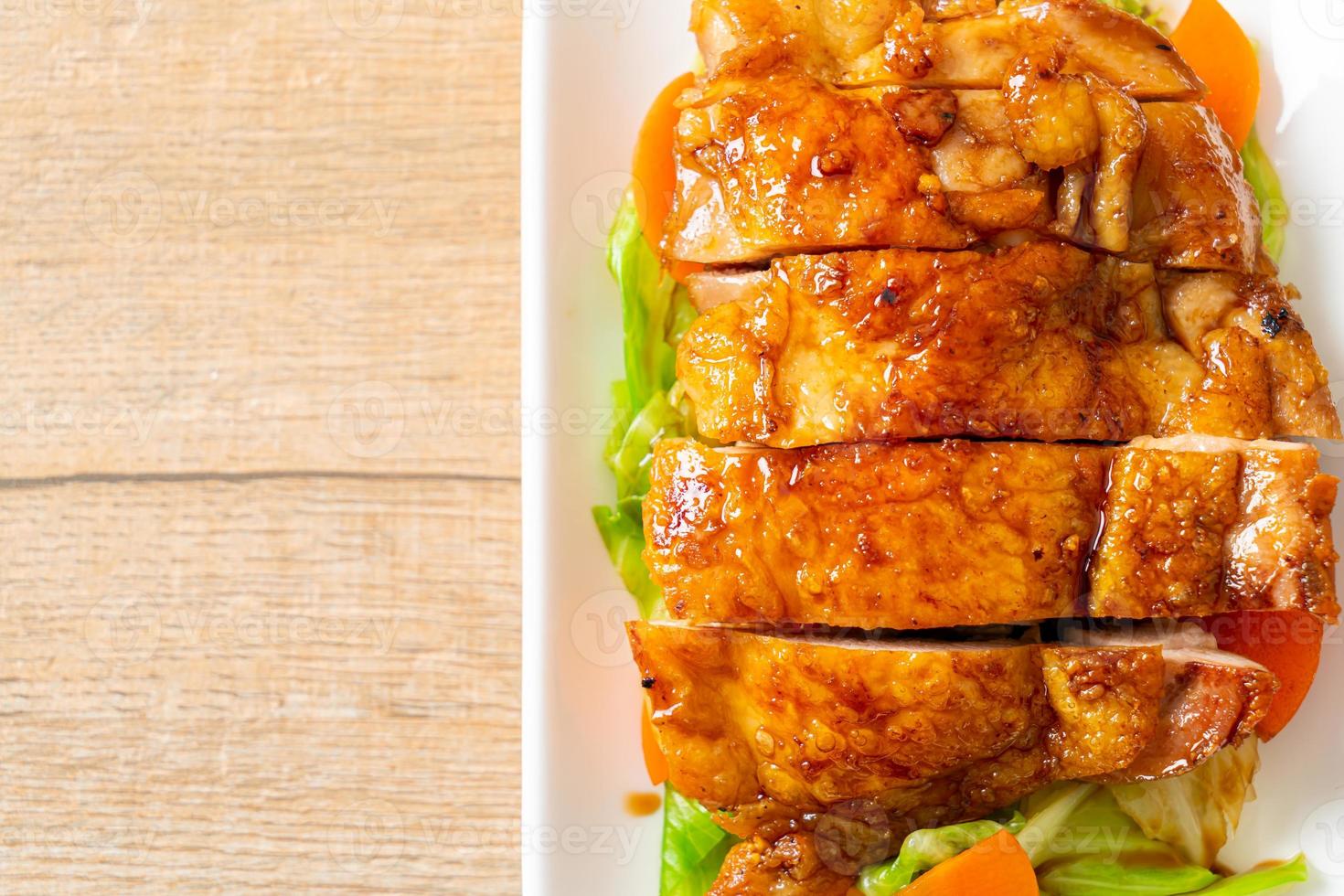 Teppanyaki teriyaki chicken steak with cabbage and carrot photo