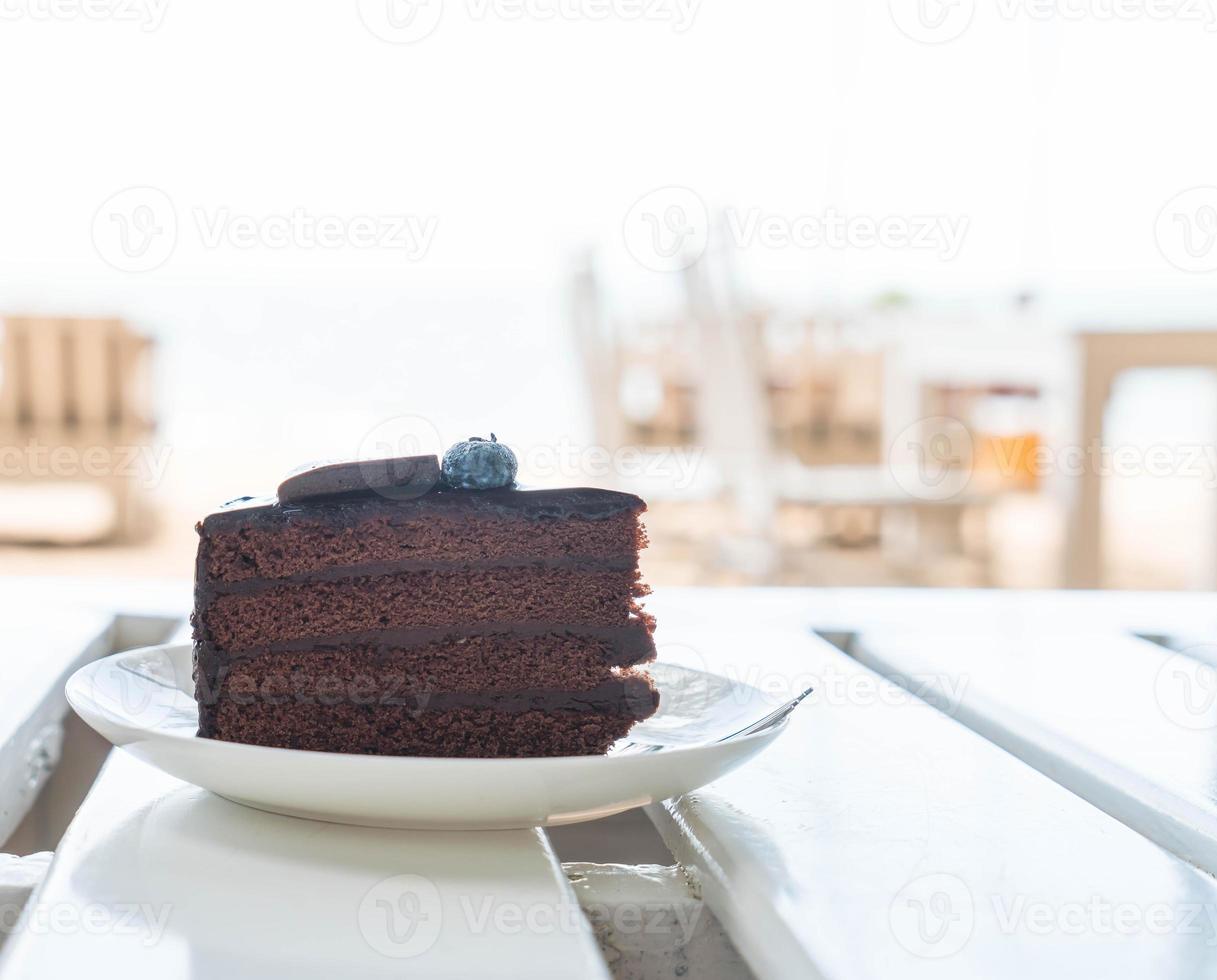 Chocolate fudge cake in cafe photo