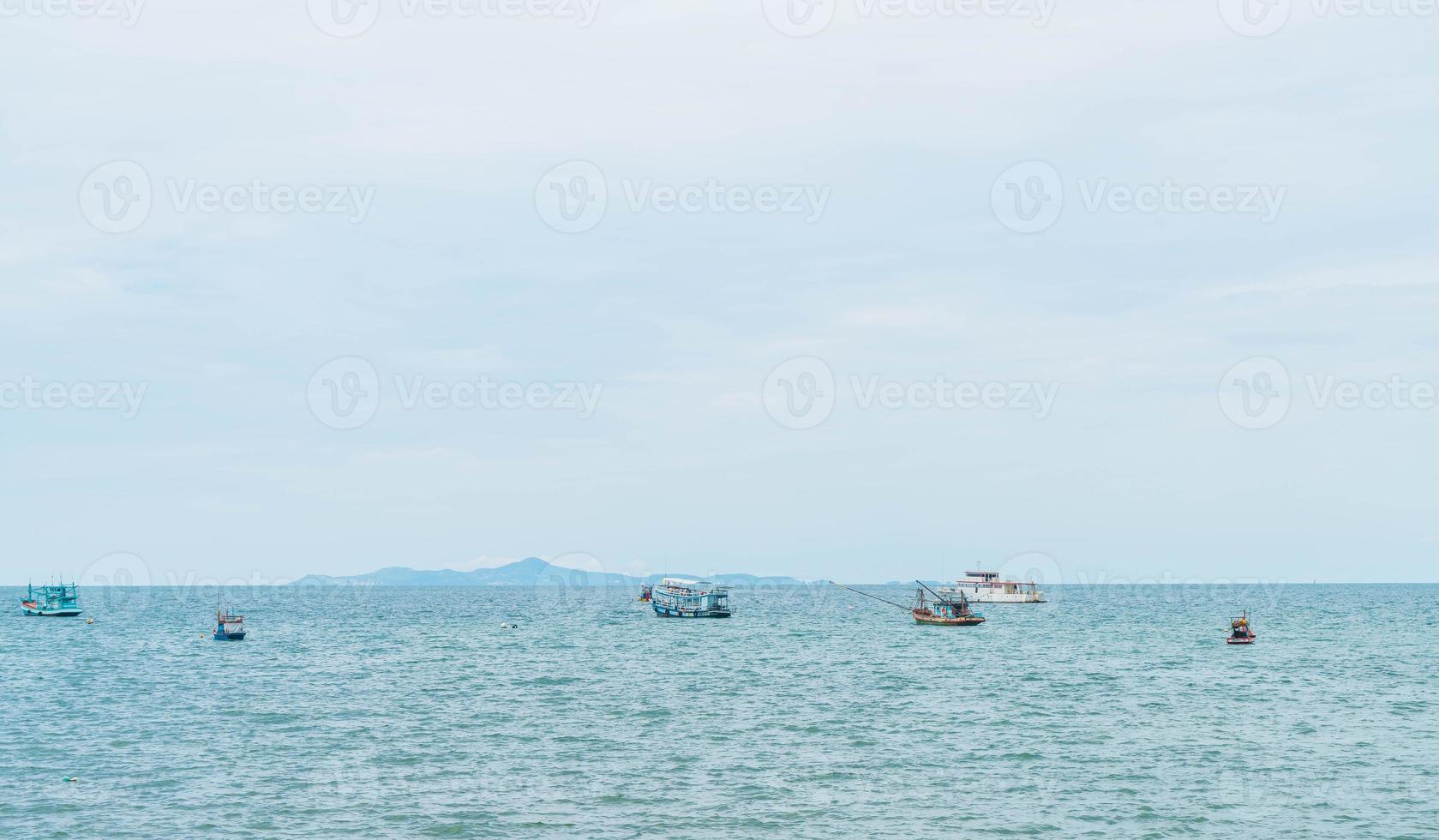 Fishing boat in the ocean photo