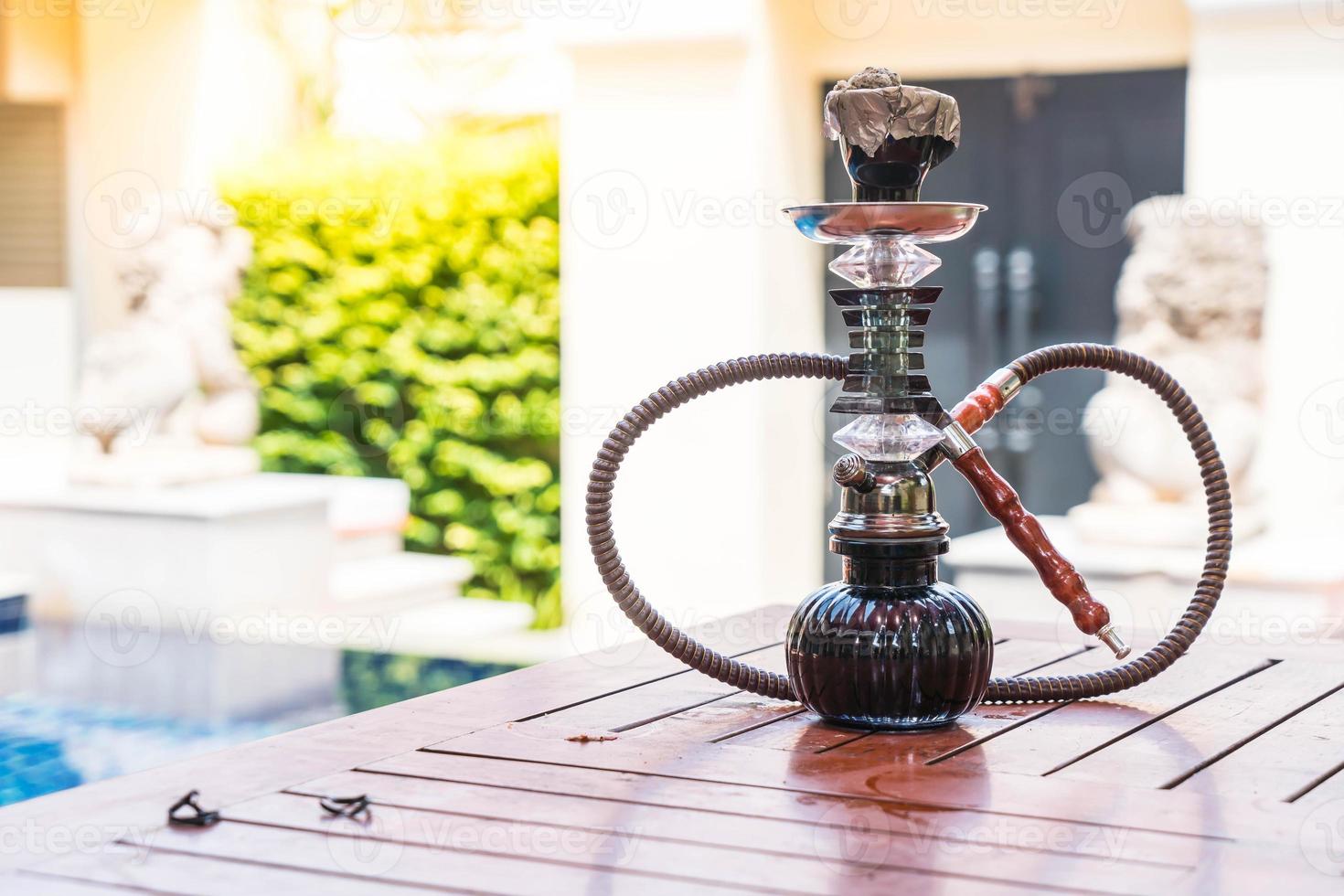 Traditional Arabic shisha pipes hookah or water pipe photo