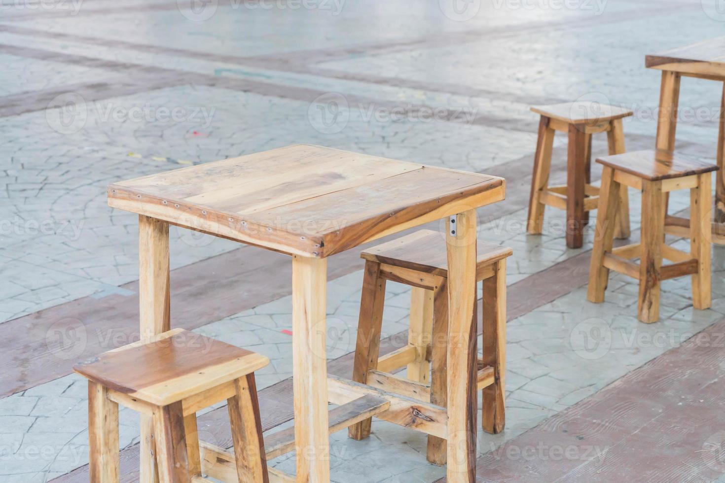 Empty wood table and chair in restaurant photo