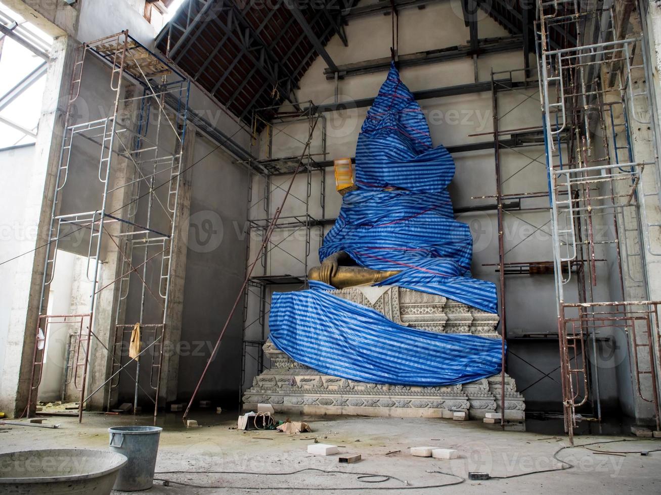 Buddha statue in temple Under construction photo