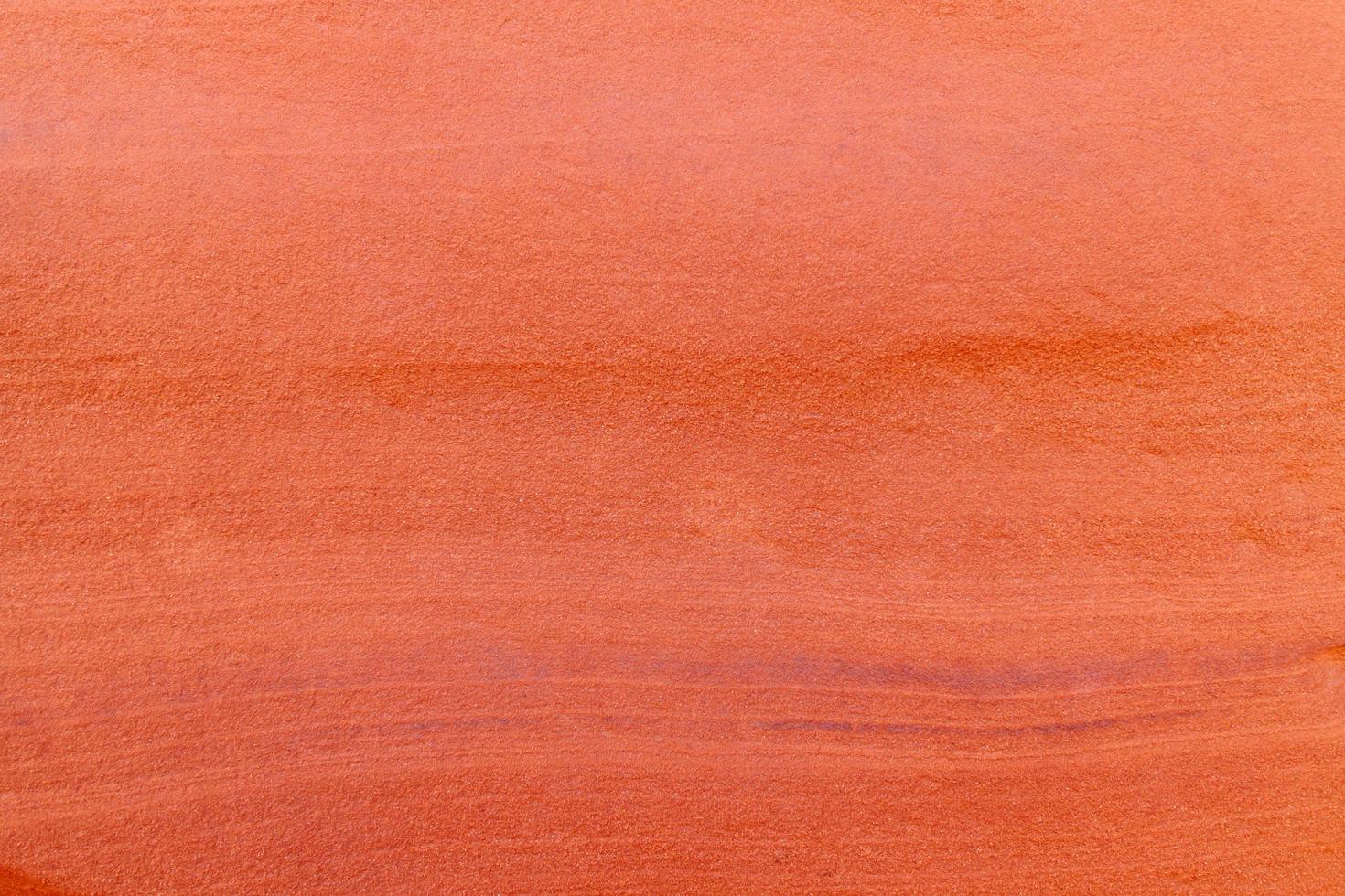 Rough red rock texture background. photo