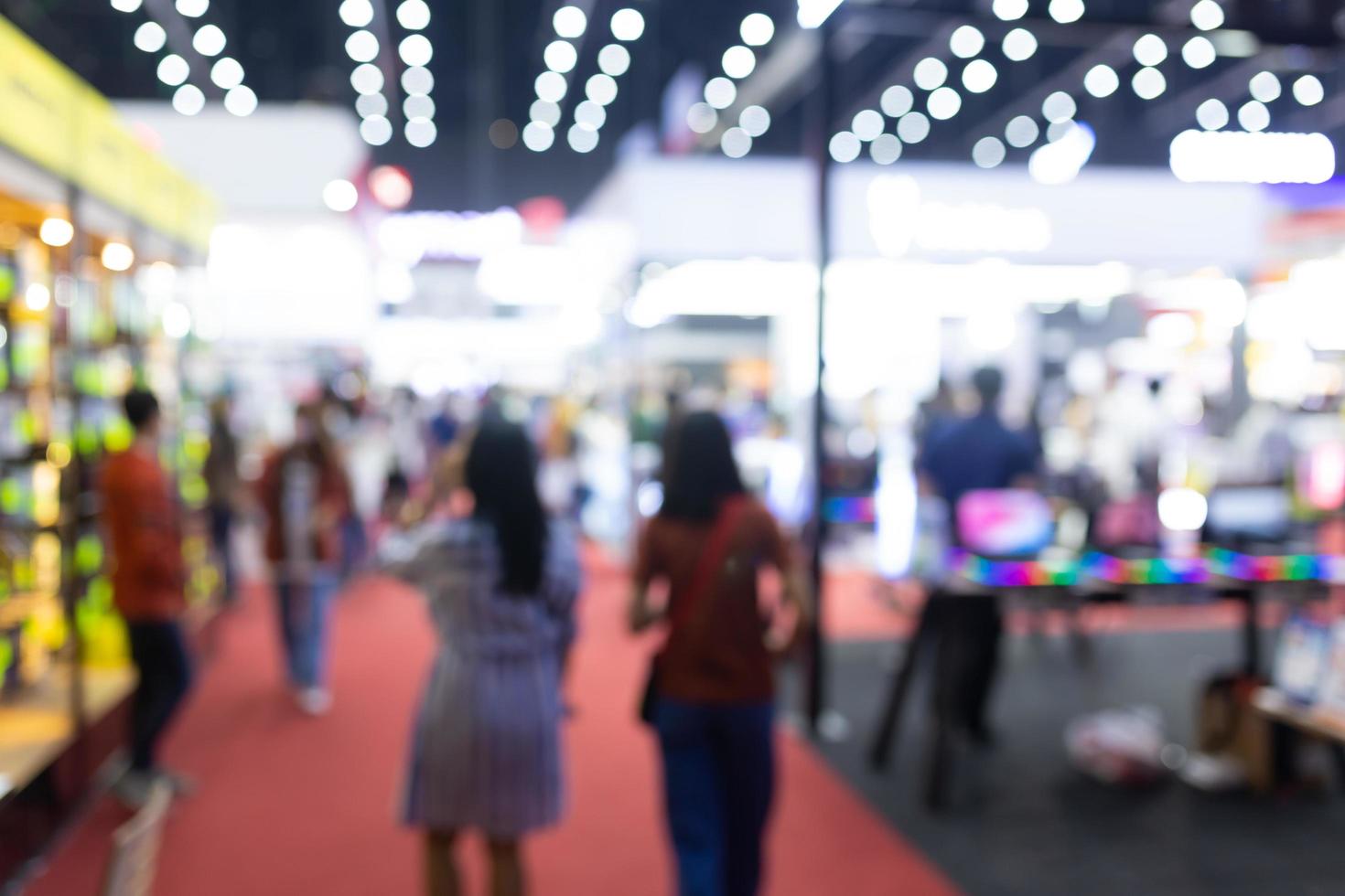 Abstract blur people in exhibition hall event trade show expo photo