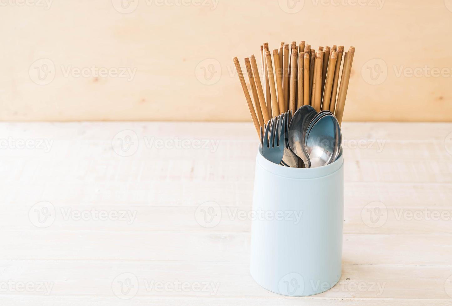 Cutlery holder chopsticks , spoon and fork photo