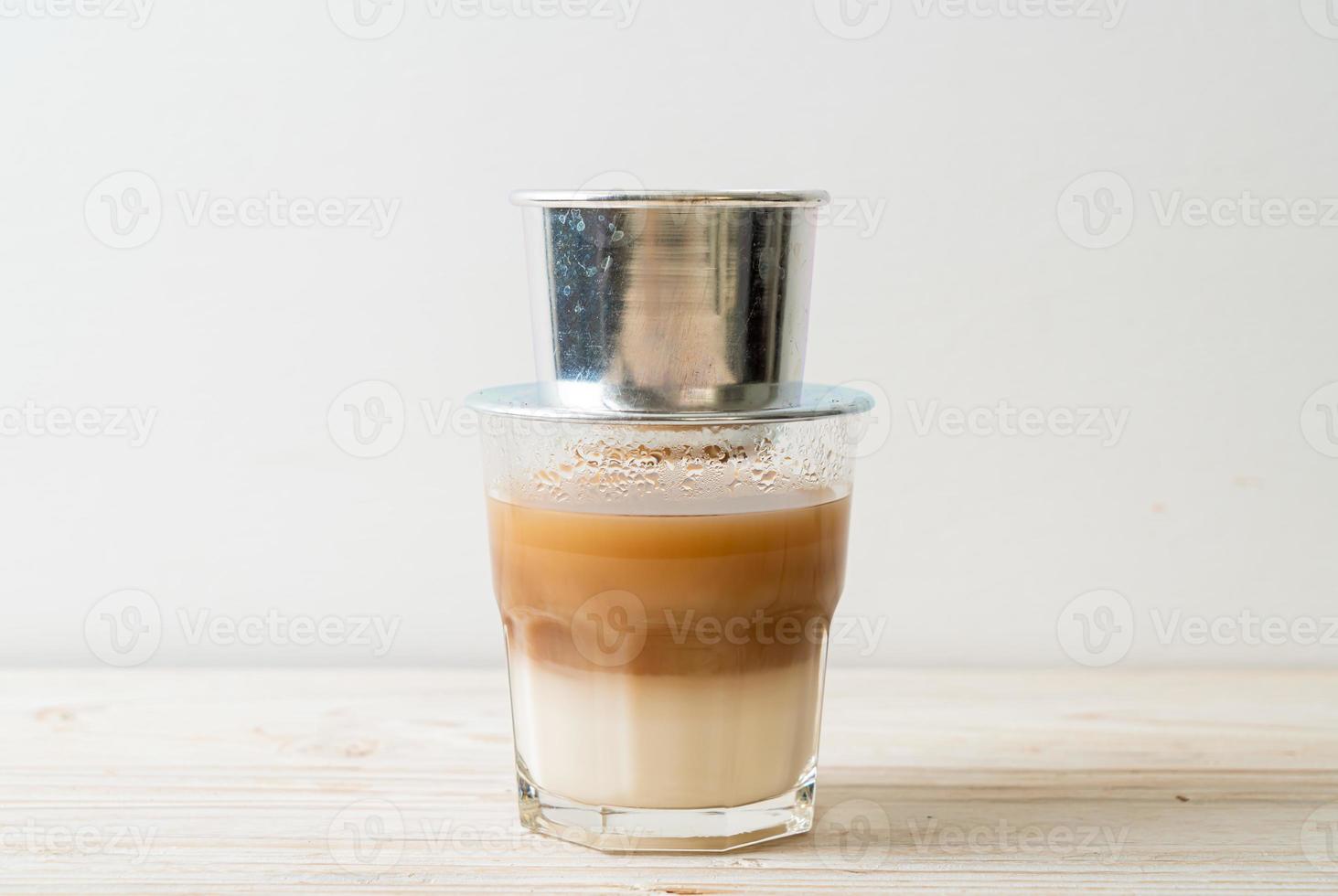 Hot milk coffee dripping in Vietnam style photo