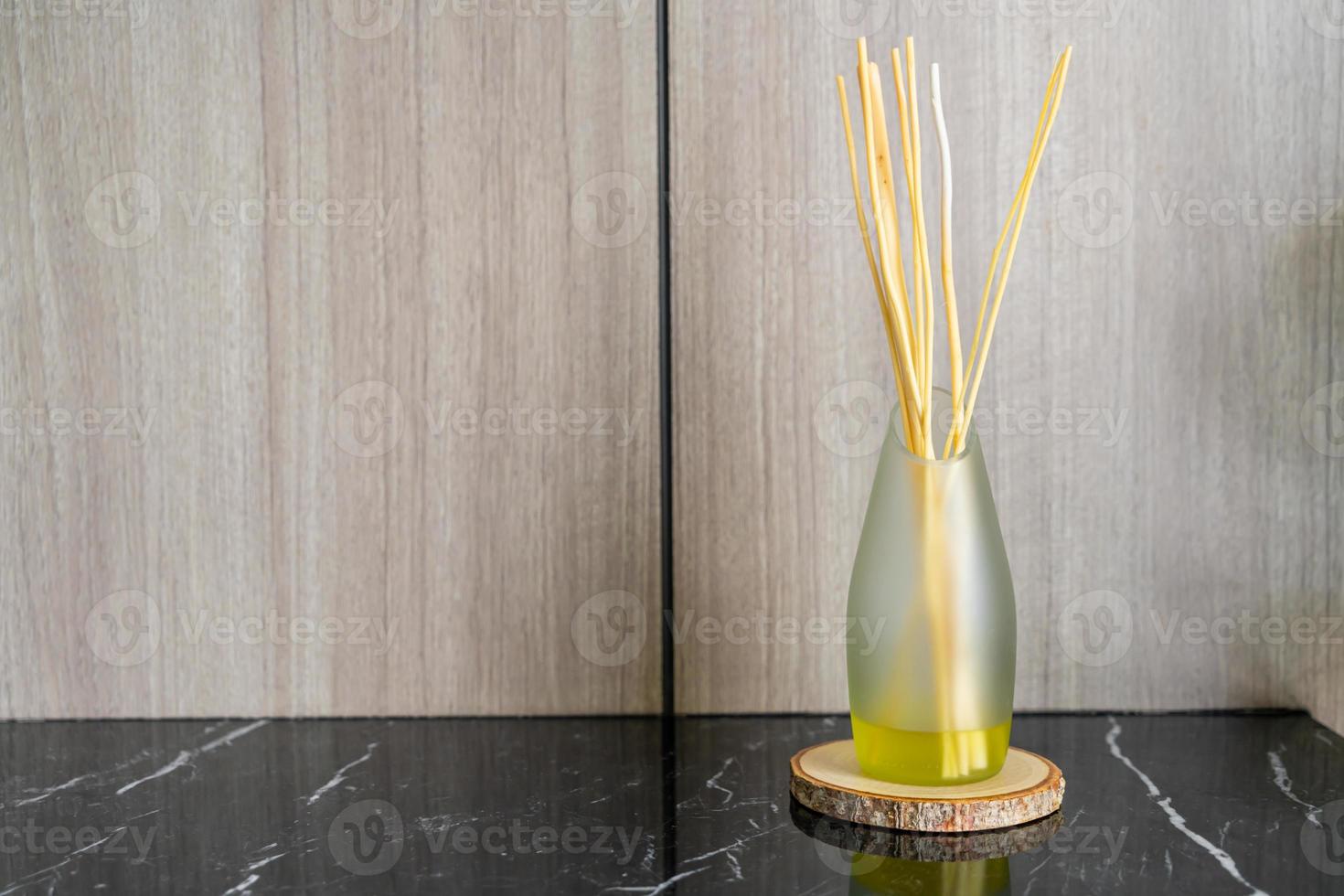 Aromatic reed freshener on table photo