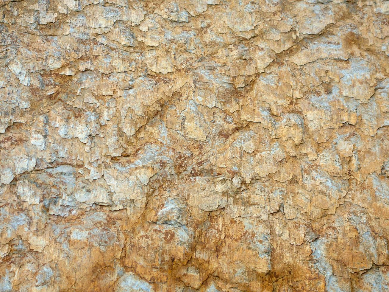 Mountain rock with grey, white, brown stones, Caucasus photo