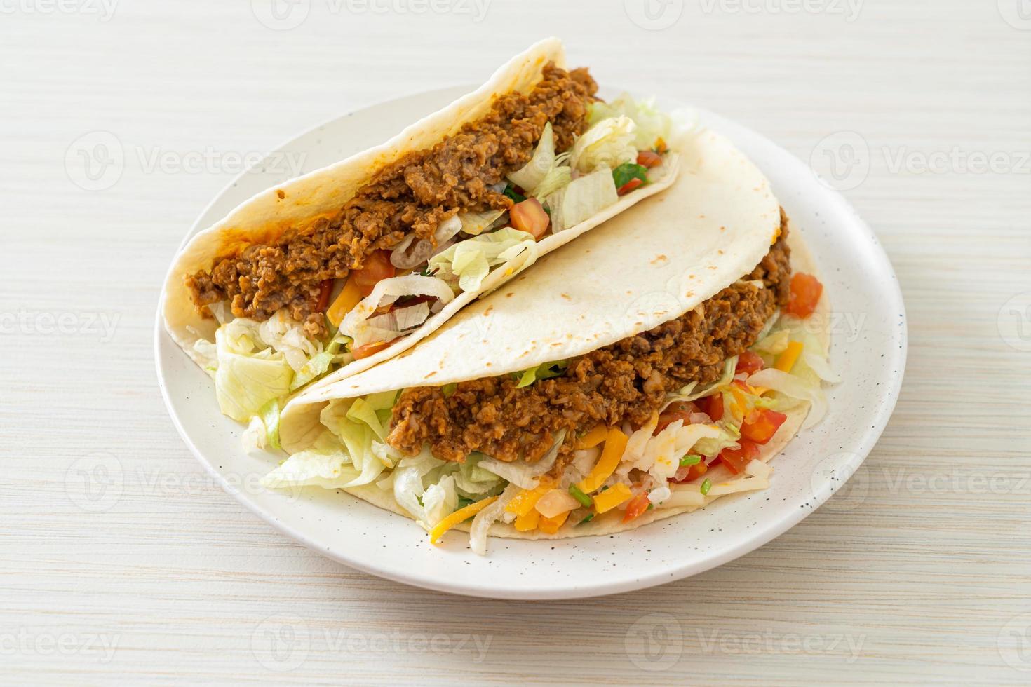 Mexican tacos with minced chicken photo