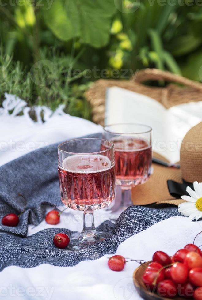 Set for picnic on blanket in lavender field photo