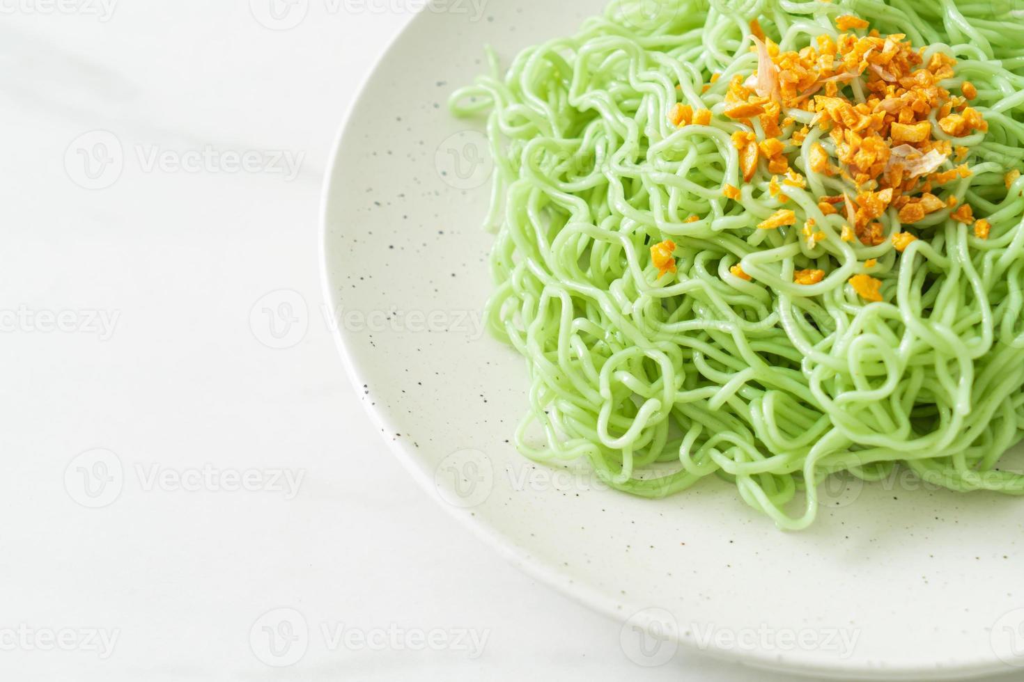 Green jade noodle with garlic on plate photo