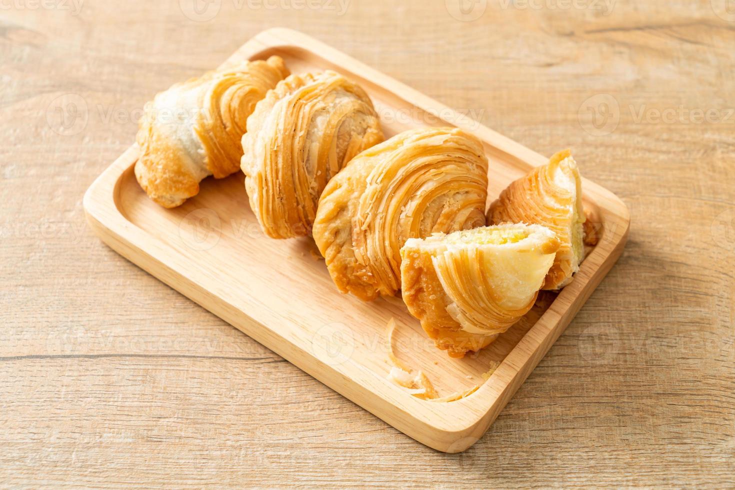 Curry puff pastry stuffed beans on wooden plate photo