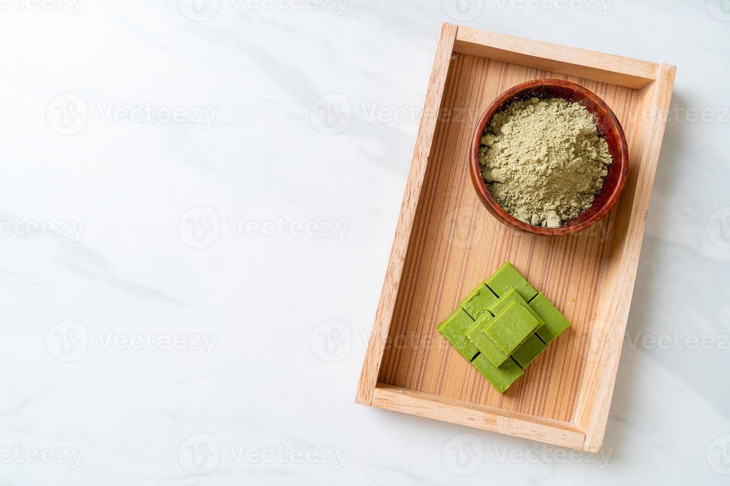 Fresh and soft matcha green tea chocolate with matcha green tea powder photo